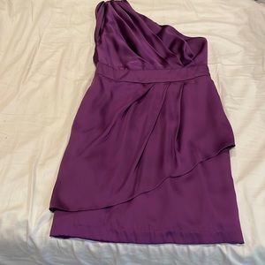 Very flattering one shoulder dress. Top is pleated